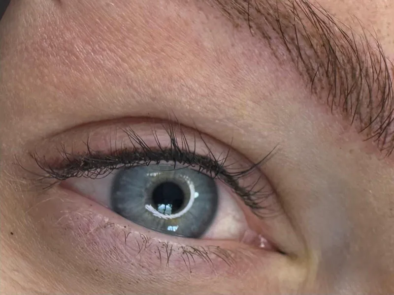 Close-up of a subtle permanent eyeliner enhancement