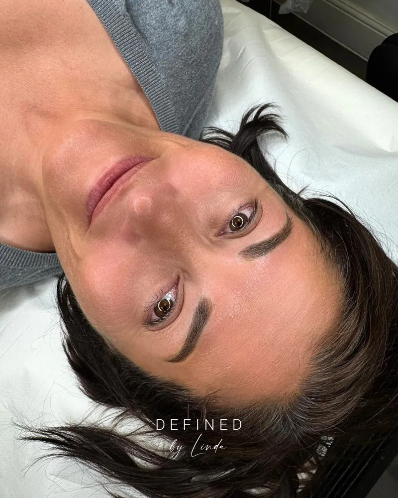 Healed microblading result showing soft, natural hair strokes